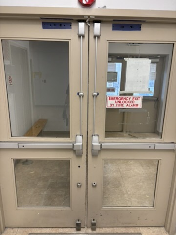 Commercial double doors with exit hardware